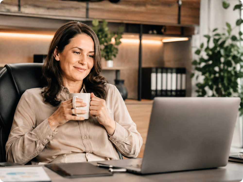 Satisfied HR manager using HR Command to manage workflow automation, ensuring repetitive tasks and compliance checks run effortlessly in the background.